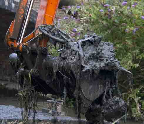 Rubbish in bucket at Mansion Lane